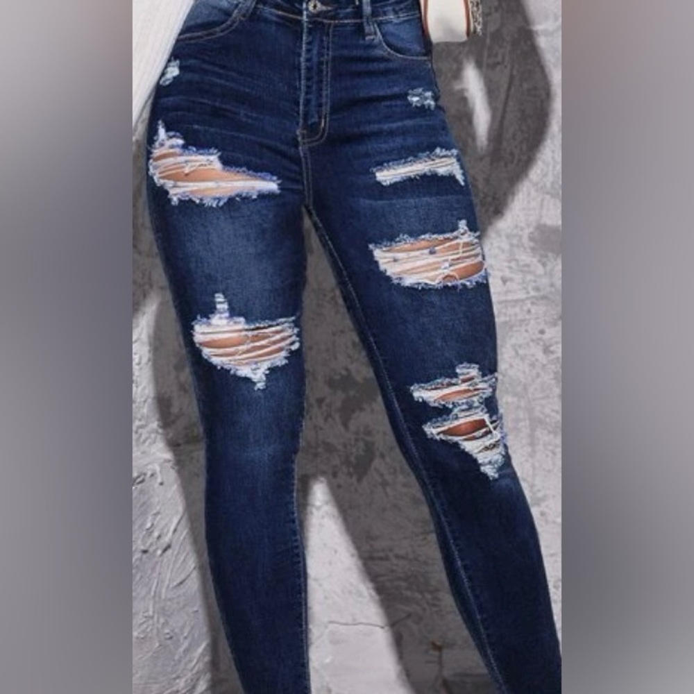 Ripped Raw Trim Skinny Jeans